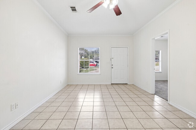 2BR, 2BA - 1,024SF - Living Room - Whispering Pines Apartments