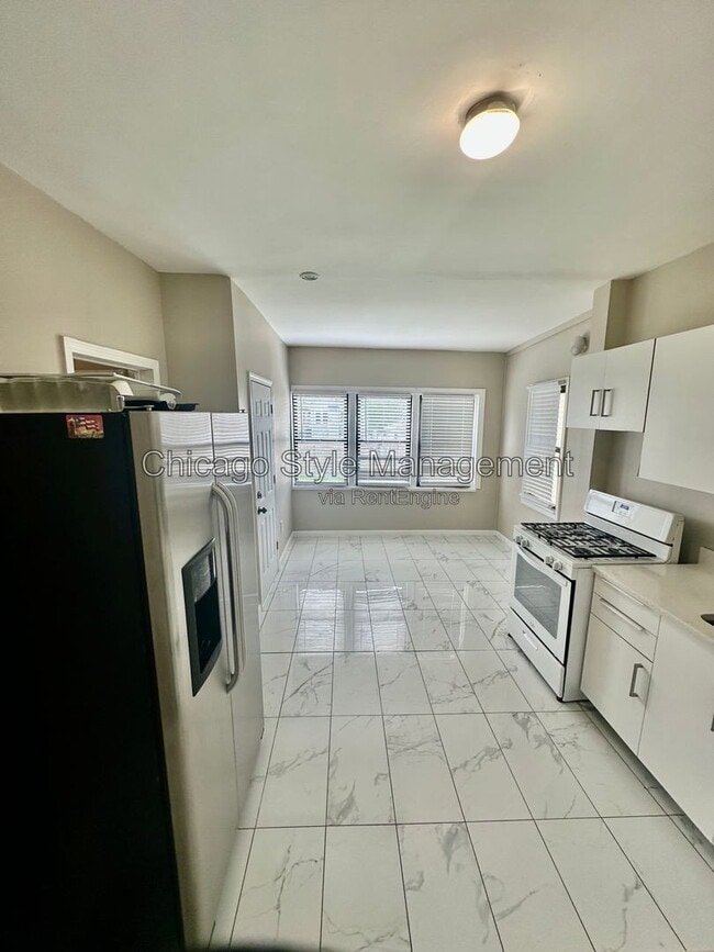 Building Photo - 2835 W 38th Pl Unit 1