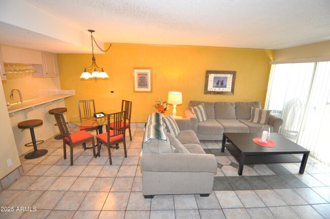 Building Photo - 3313 N 68th St Unit 227