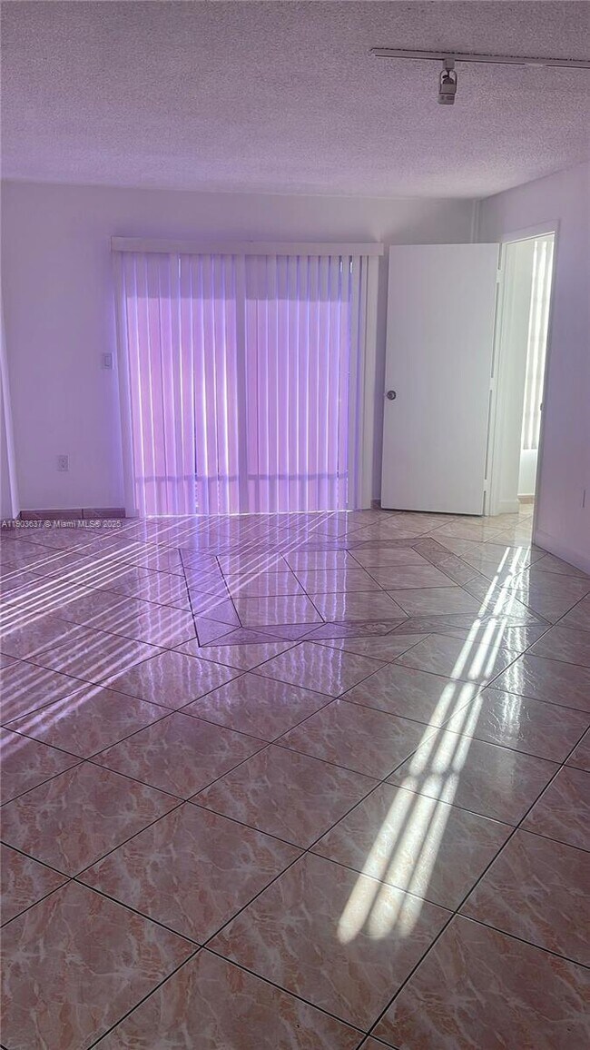 Building Photo - 4801 NW 7th St Unit 703-16