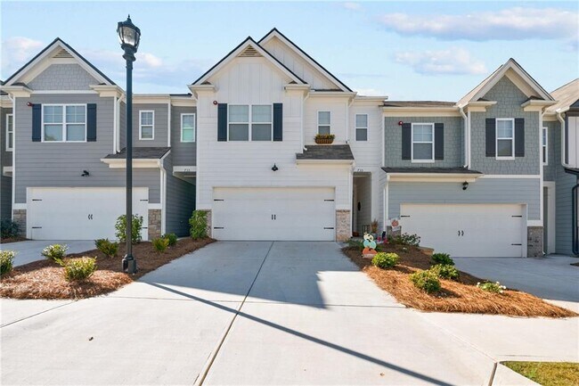 Photo - 735 Woodstock Grove Dr Townhome
