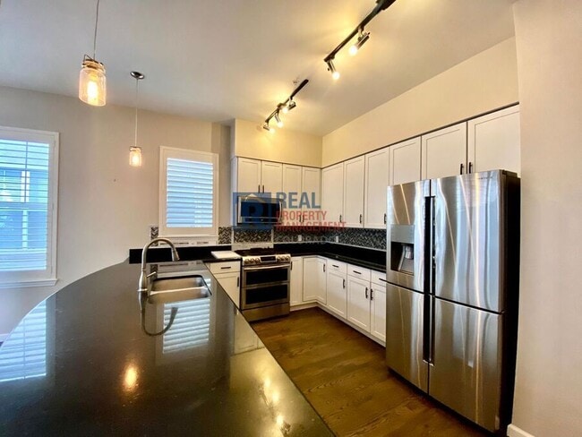 Photo - 1489 Steele St Unidad 205