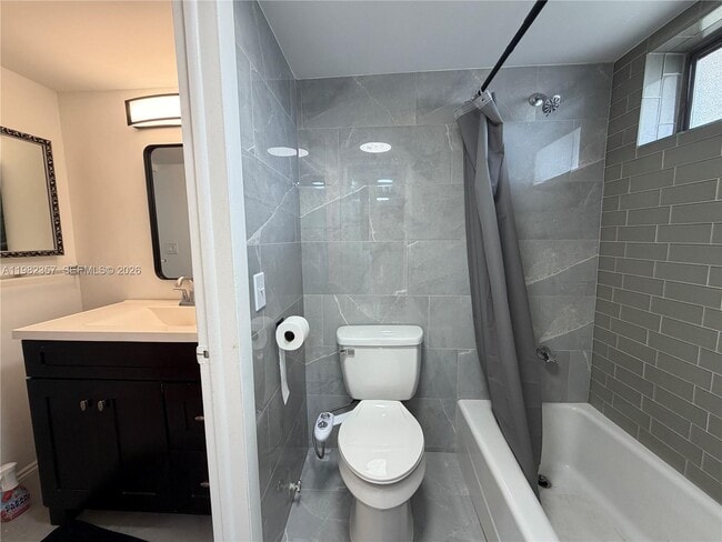 Building Photo - 6020 NW 64th Ave Unit 306