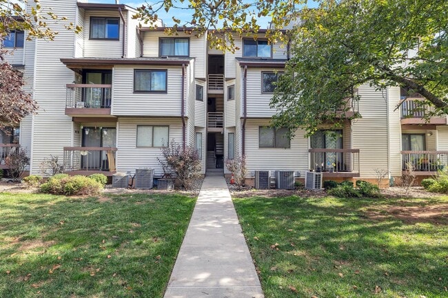 Clear view of the buildings exterior, highlighting its well-maintained design and curb appeal. - 3320 Richmond Ct