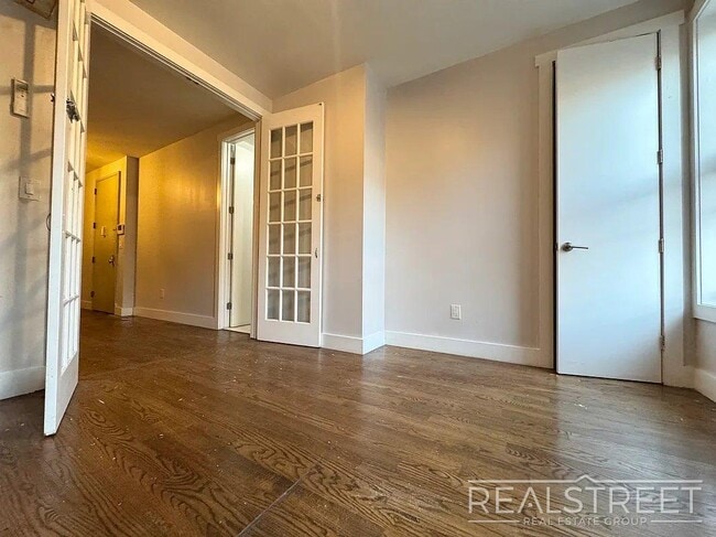 Photo - True 3 Bedroom layout — no flex, no railroad - Massive full-floor basement with second private entra Unit 2L