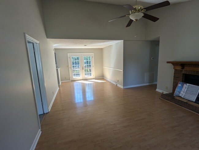 Front room. Tall ceilings and lots of natural light - 1528 Stone Hill Rd