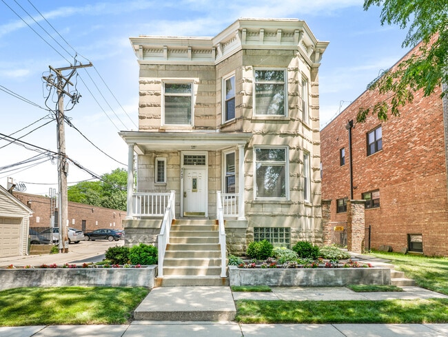 Building Photo - 4749 N Long Ave Unit 1