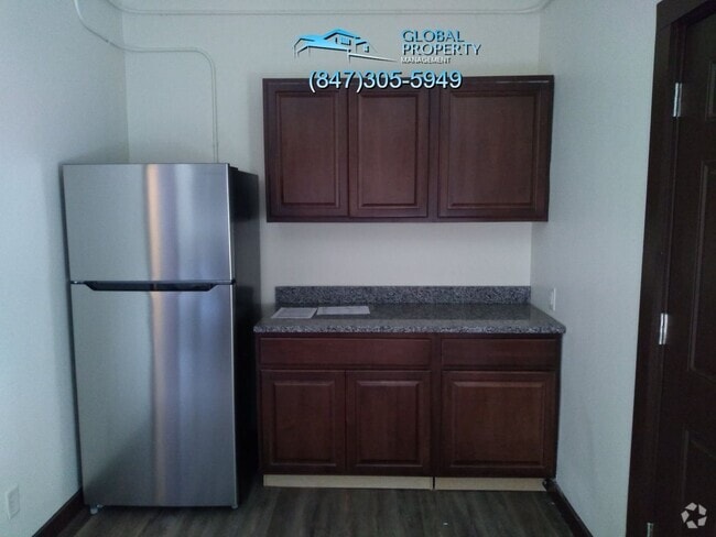Building Photo - 6311 27th Ave Unit #2 Rental