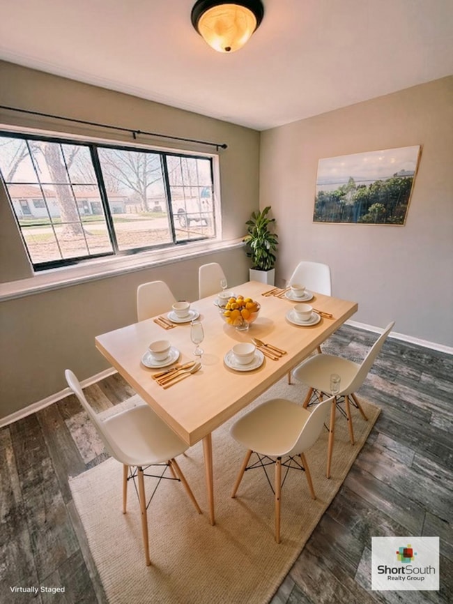 Photo - Updated 2 bed 1 bath main floor apartment with covered detached garage