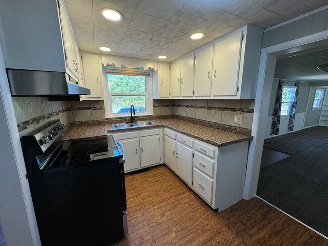 Photo - Spacious 3-Bedroom, 1-Bathroom Home with Pole Building – $1,525/Month