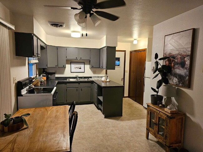 Photo - Spacious 3-Level Home with Garage & Off-St... Unit B