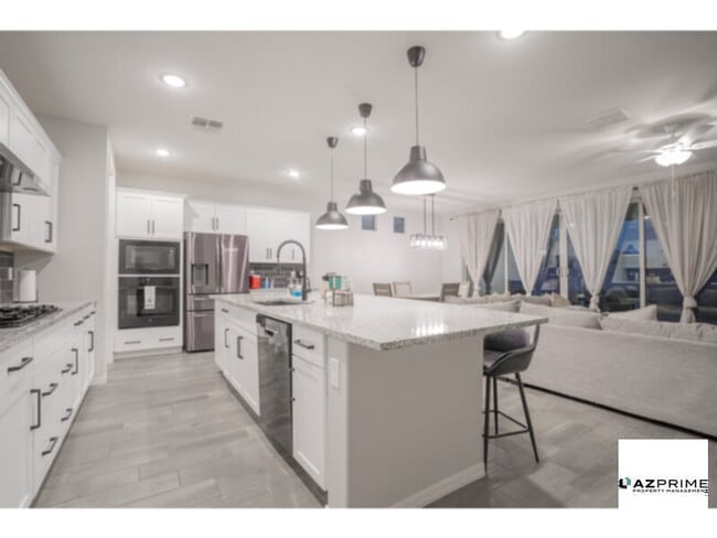 Photo - Presenting An Exquisitely Crafted 3/2.5 Goodyear Jewel Where Modern Sophistication Meets Serene Comf