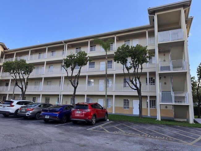 Building Photo - 6940 NW 179th St Unit 108-7