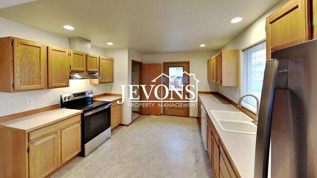 Photo - Two-bedroom home with a fully equipped kit...