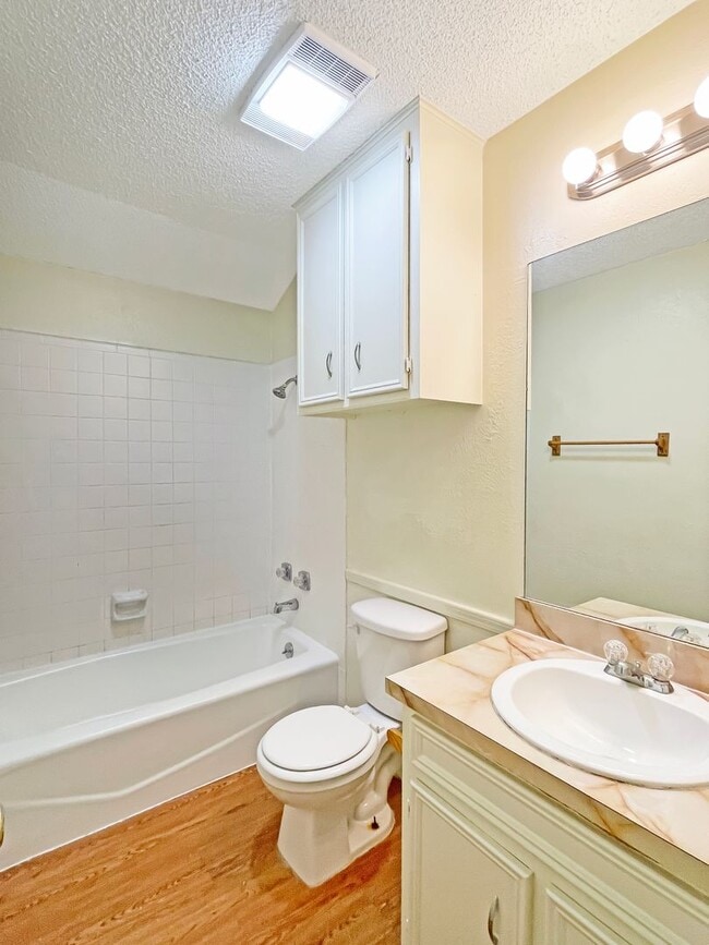 Photo - Spacious 3-Bedroom Duplex with Covered Parking & Fenced Yard!
