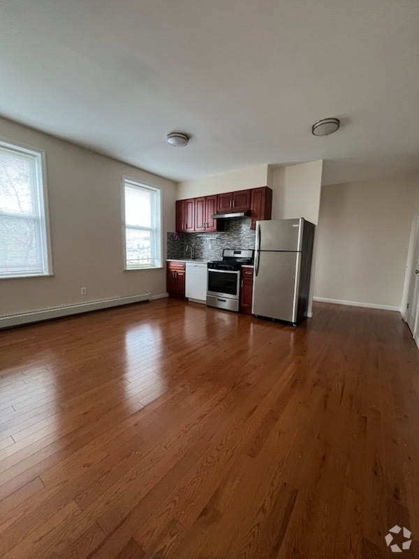Building Photo - 8684 15th Ave Unit 2F Rental