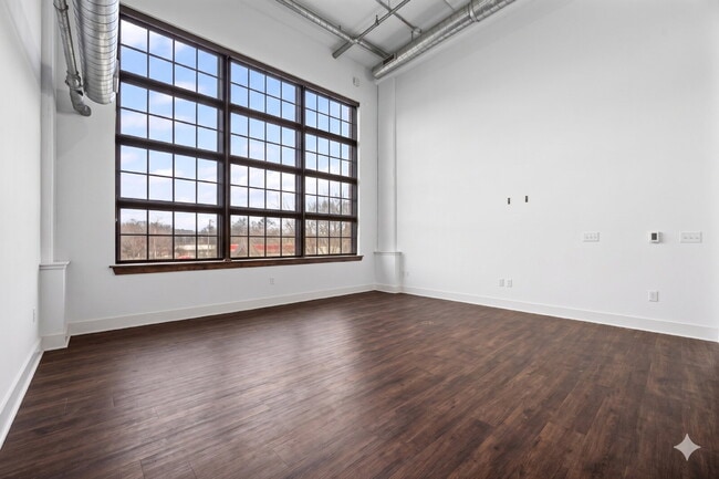 Urban Loft Condo Featuring Stunning Views & Rooftop Entertaining