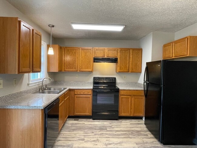 Photo - SW Updated Home - Wood Laminate Flooring, Front Porch & Deck!