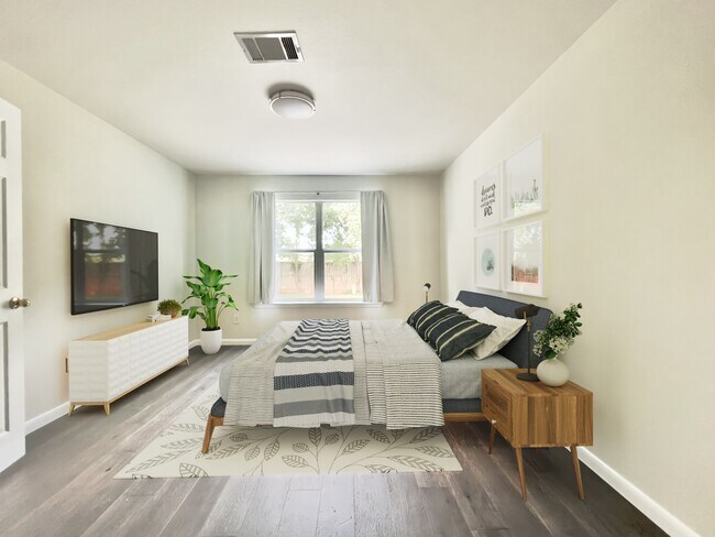Master bedroom (staged) - 7701 Peabody Dr