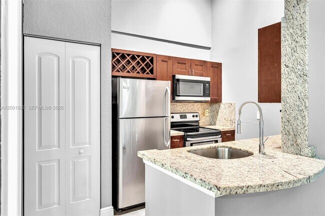 Building Photo - 2851 N Oakland Forest Dr Unit 306