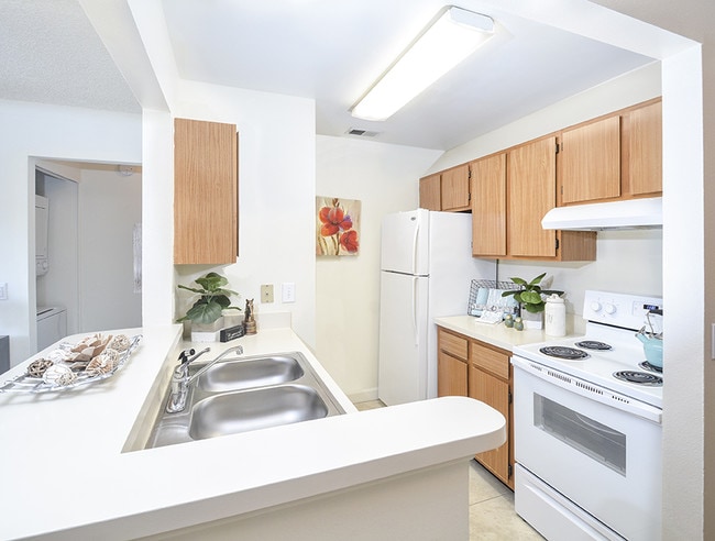 Kitchens with White Appliances - Latigo 27 Apartments