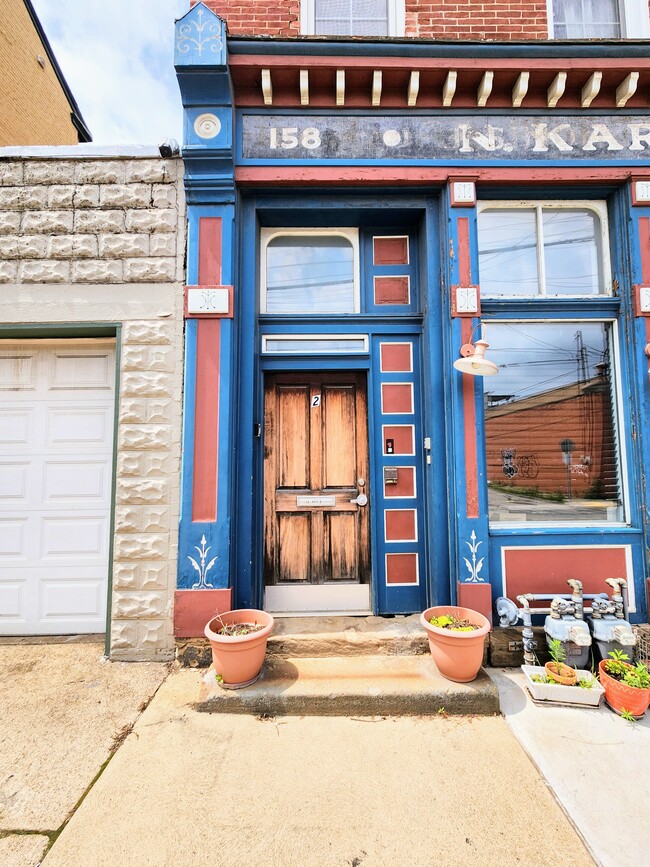 Building Photo - 158 48th St Unit 2