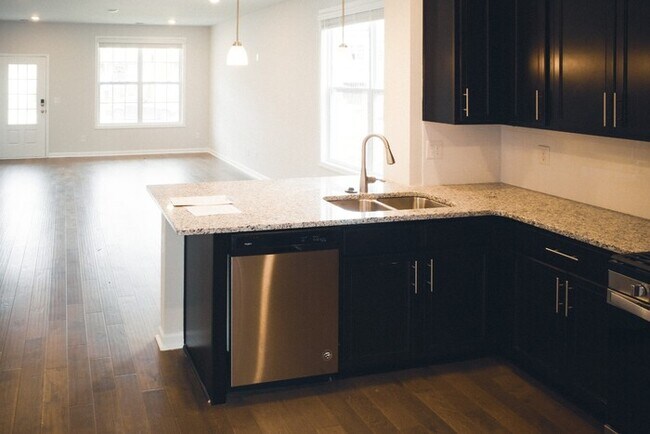 Photo - 4 Bed/ 3 Bath Townhome with Immediate Occupancy!