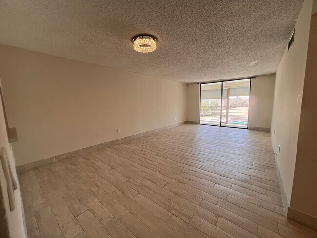 Photo - Great unit with pool view, pretty tile flooring.