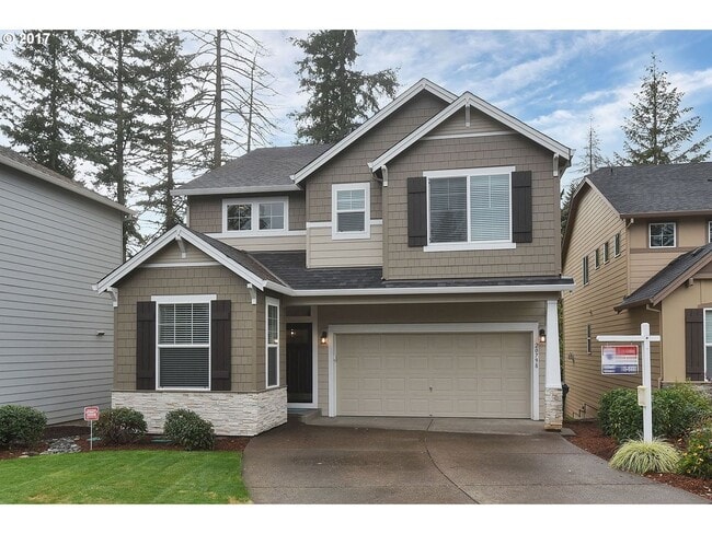 Building Photo - Bright and Open Floor Plan with Fireplace, Attached Garage & Vaulted Ceilings