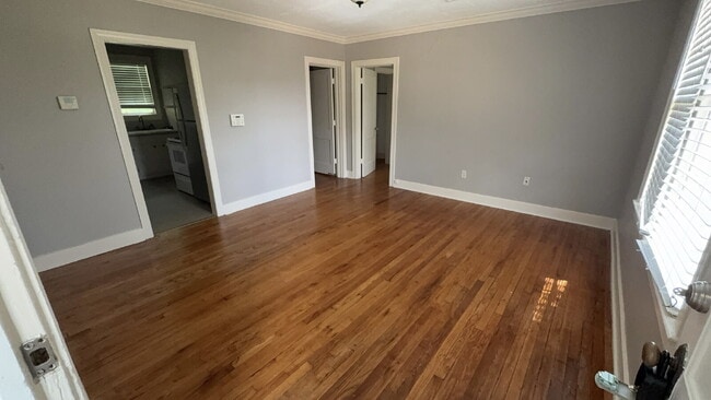 Photo - 2/1 apartment in Belhaven. Sleek gray walls with beautiful hardwoods, tile kitchen floors, W/D an... Unit 2
