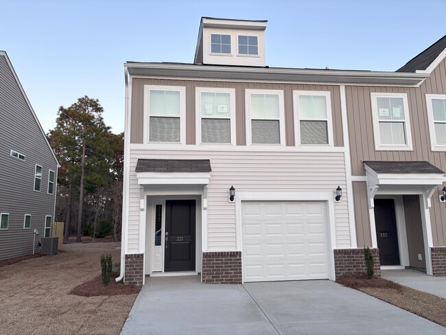 Front Elevation - 331 Canary Grass Ct Townhome