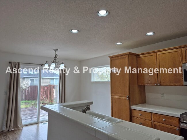 Photo - Bethany 3 Bed + Office on Main Fenced Back Yard w/Deck 2 Car Attached Garage Available Now!