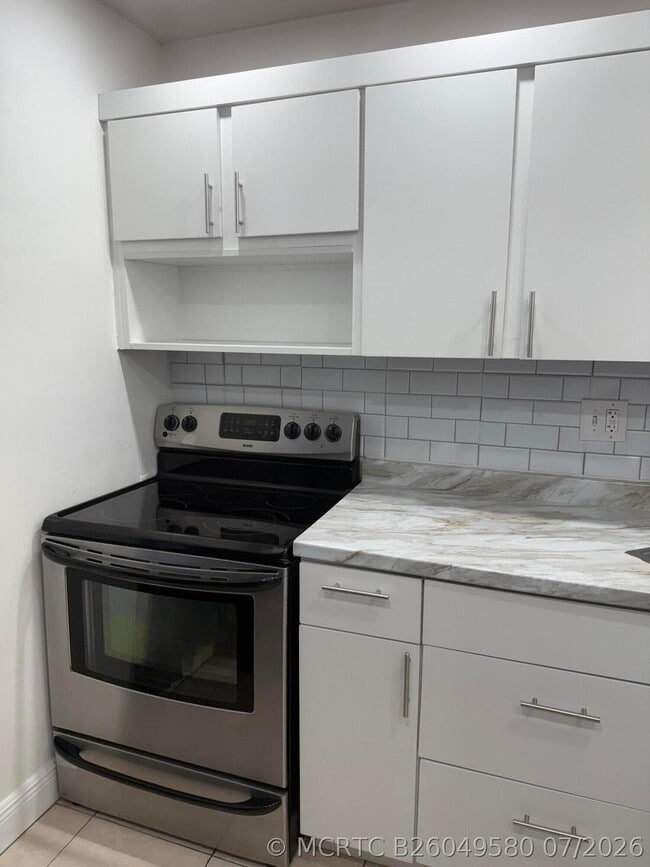 Building Photo - 5750 NW 64th Ave Unit 106