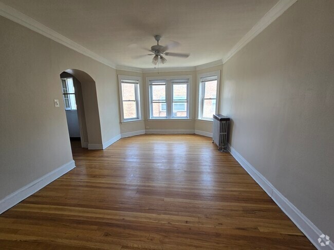 Building Photo - 1936 W Estes Ave Unit 3S Rental