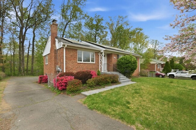 Photo - This inviting four bedroom, two bath home with a spacious detached two car garage is located in t...