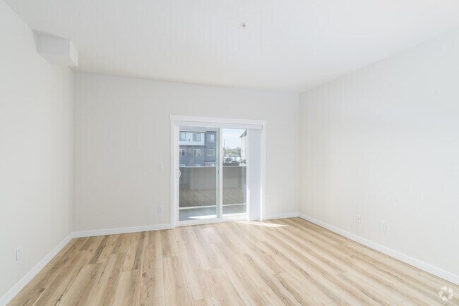 3BR, 2BA - 1,210SF - Living Room - Bonneville Apartments
