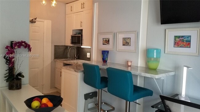 Building Photo - 7300 Ocean Terrace Unit 209