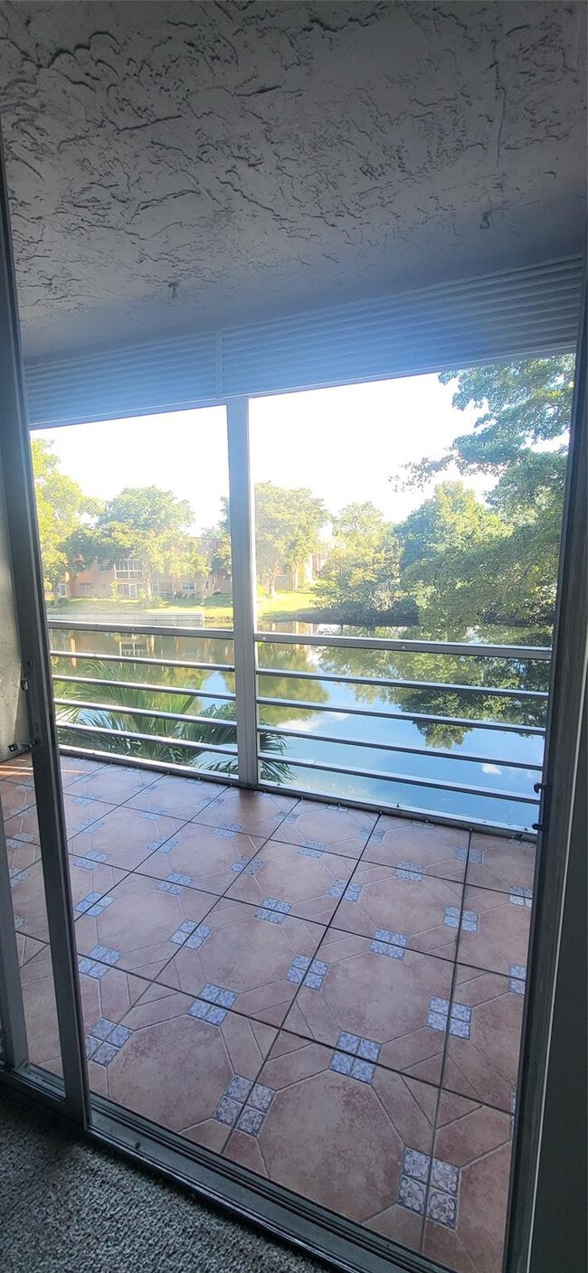 Photo - 9070 Lime Bay Blvd Unidad 309