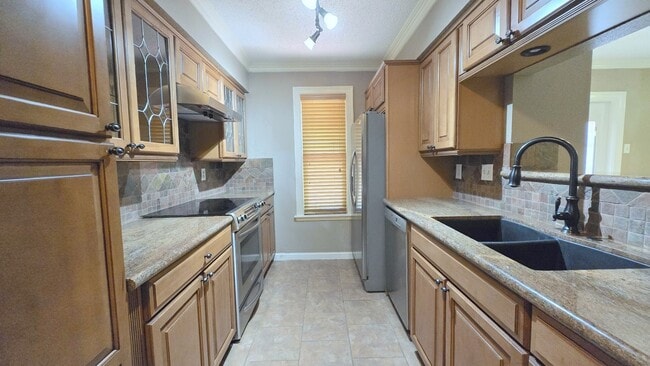 Building Photo - 10555 Turtlewood Ct Unit 1408 Rental