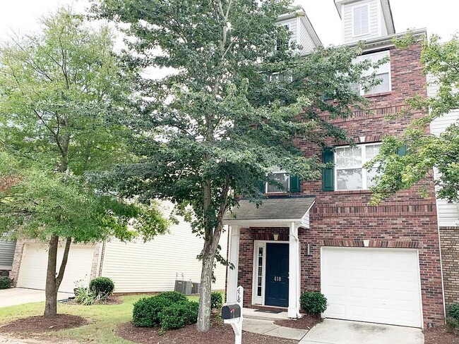 Photo - 418 Woodbark Ct Townhome