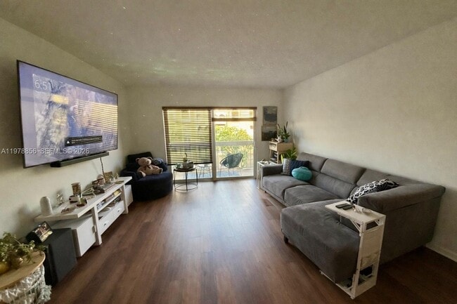 Building Photo - 7730 Camino Real Unit F-309