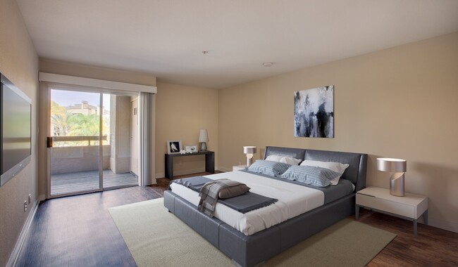 The spacious master bedroom features accent wall and private bathroom