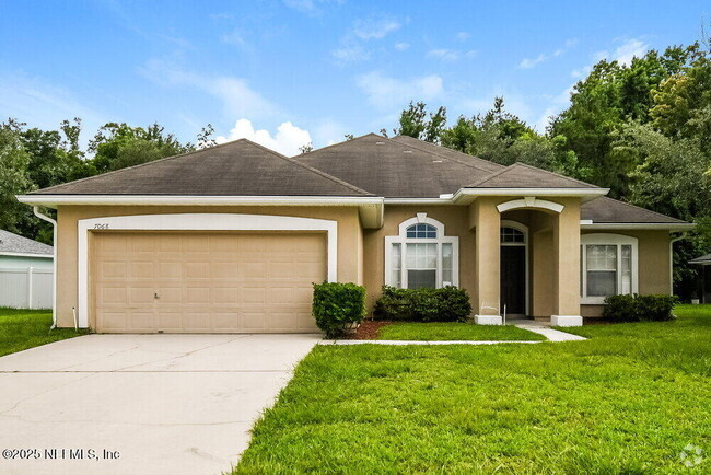 Building Photo - 7068 Rapid River Dr W Rental