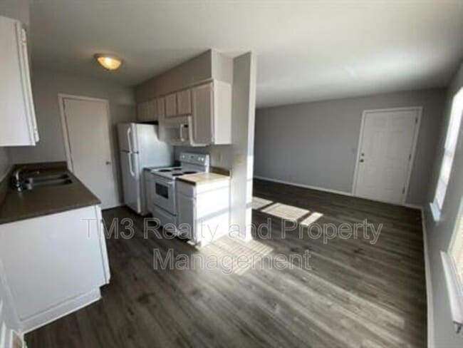 Building Photo - 1606 E Kansas City Rd Unit 4 Rental
