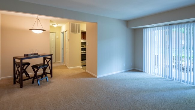 Expansive living and dining area leads to kitchen