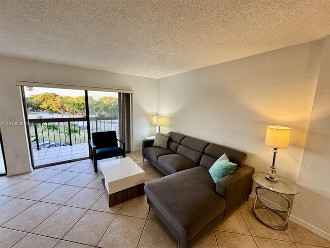 Building Photo - 1300 SW 122nd Ave Unit 421-2