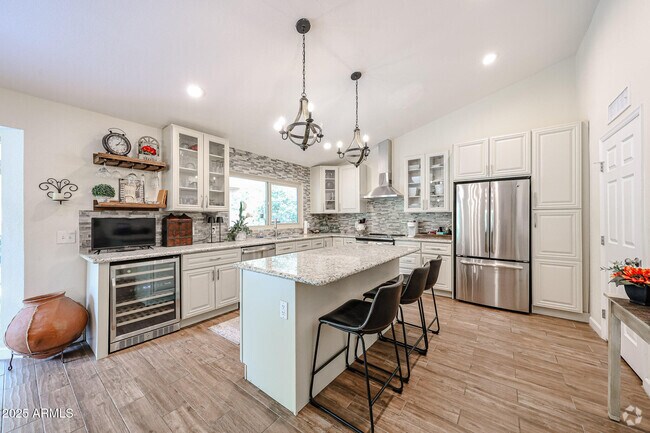Building Photo - 9085 E Windrose Dr Rental