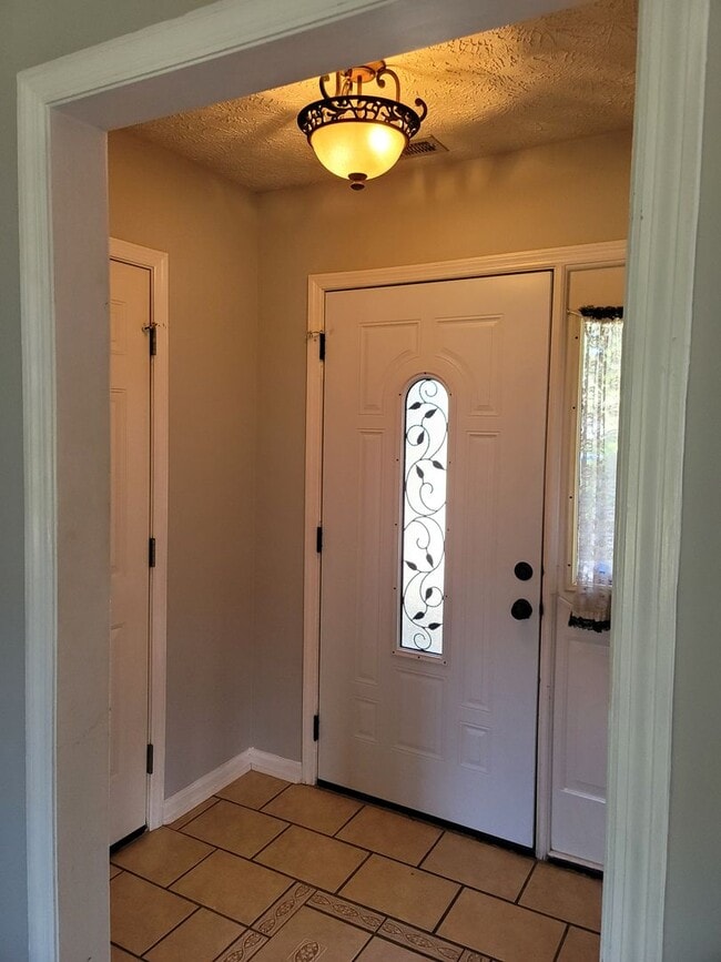 Photo - Newly Renovated 3 Bedroom, 2 Bath Ranch Home. Minutes from Shopping & Restaurants!