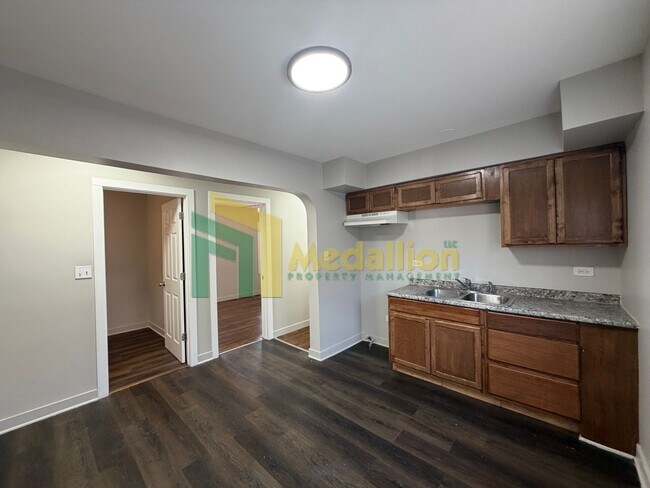 Photo - Updated 4-Bedroom Brick Ranch with Side Drive and Yard