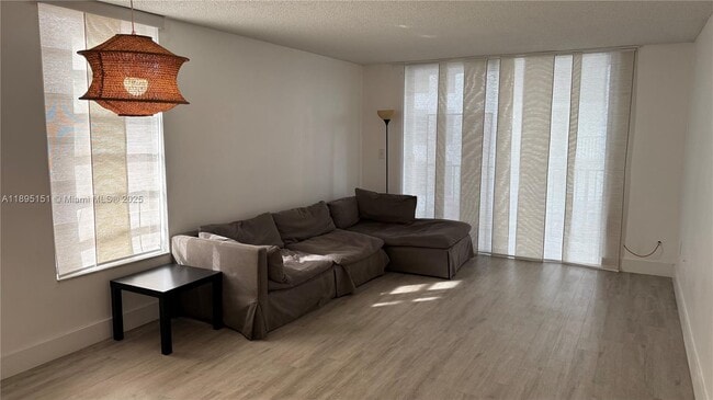 Building Photo - 9688 Fontainebleau Blvd Unit 201